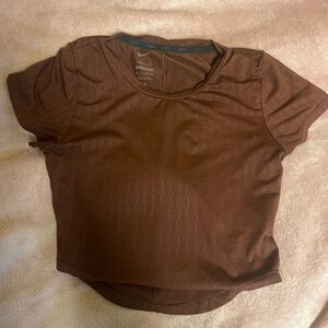 orangey brown nike crop top